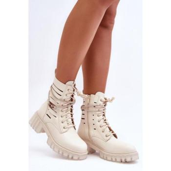 Divat kiegészítők és ruhák kiárusítása - Női bézs színű, kivágásokkal ellátott munkásnadrág akciósan kép