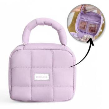 Kozmetikai táskák - Steppelt lila kozmetikai táska fogantyúval kép