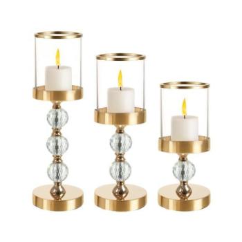 Ünnepi dekorációk - 3 darabos üveg gyertyatartó készlet arany színben kép